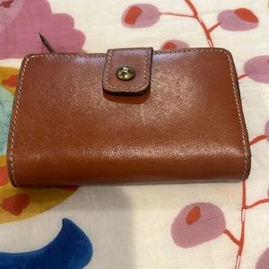 Bi-fold Patricia Nash genuine leather wallet.